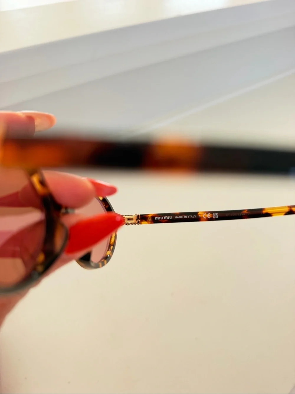 Miu Miu Pink Lens Tortoiseshell Oval Sunglasses